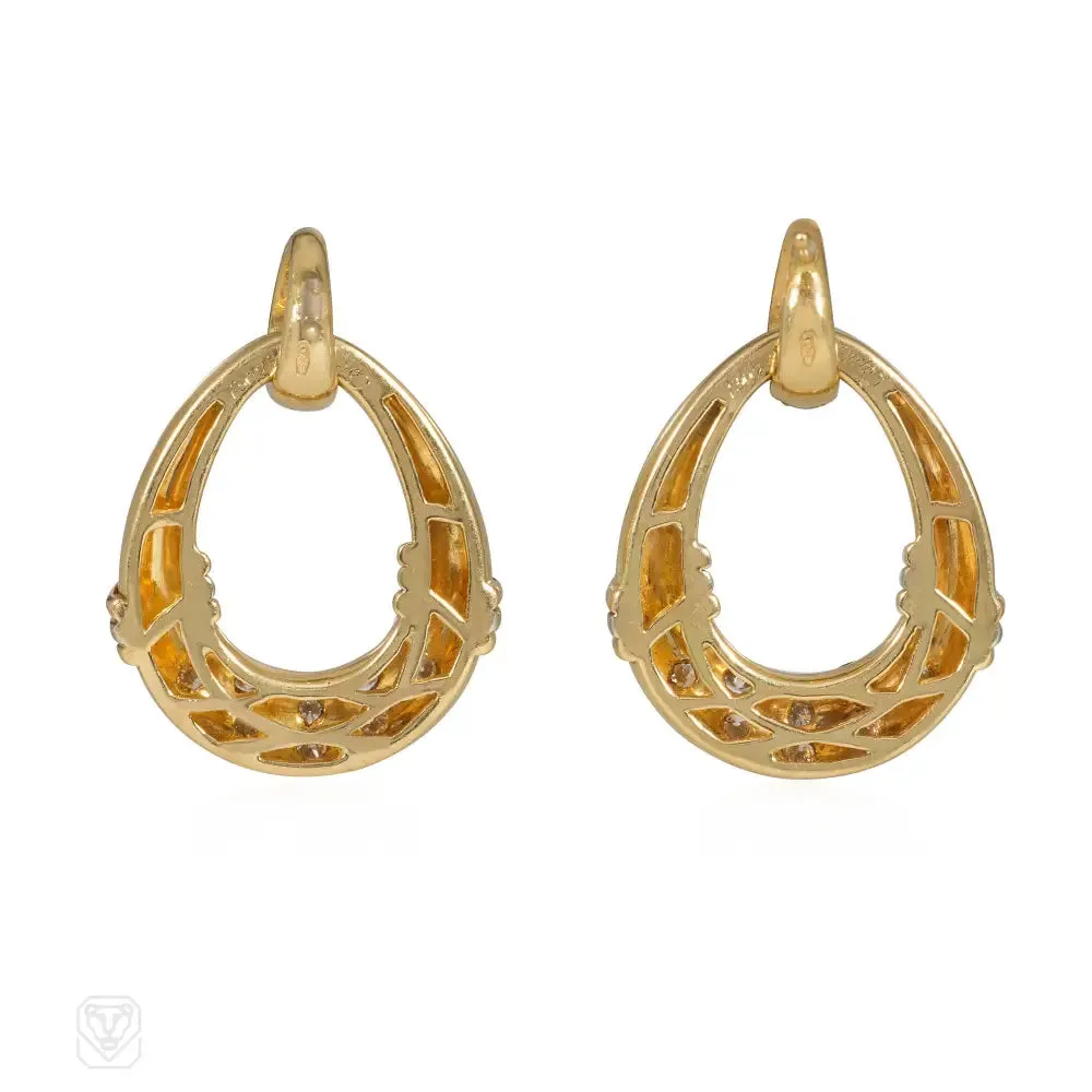 Cartier gold and diamond doorknocker earrings